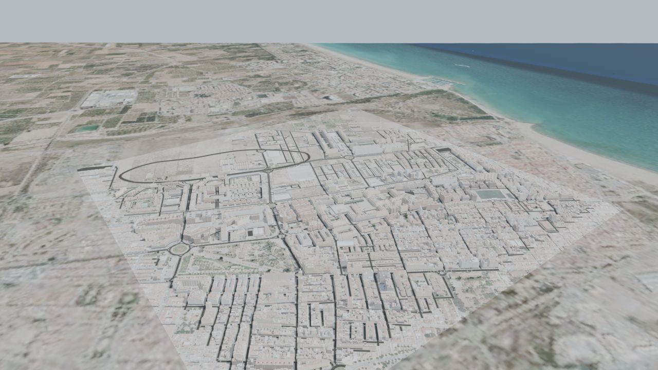 Vista aérea de una de las primeras pruebas: un circuito trazado al norte del Puerto de Sagunto, con la ciudad generada y el mar al fondo.